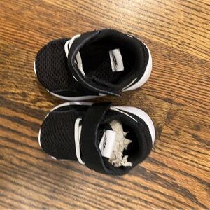 Black and White Baby Sneakers Nike never been worn brand new